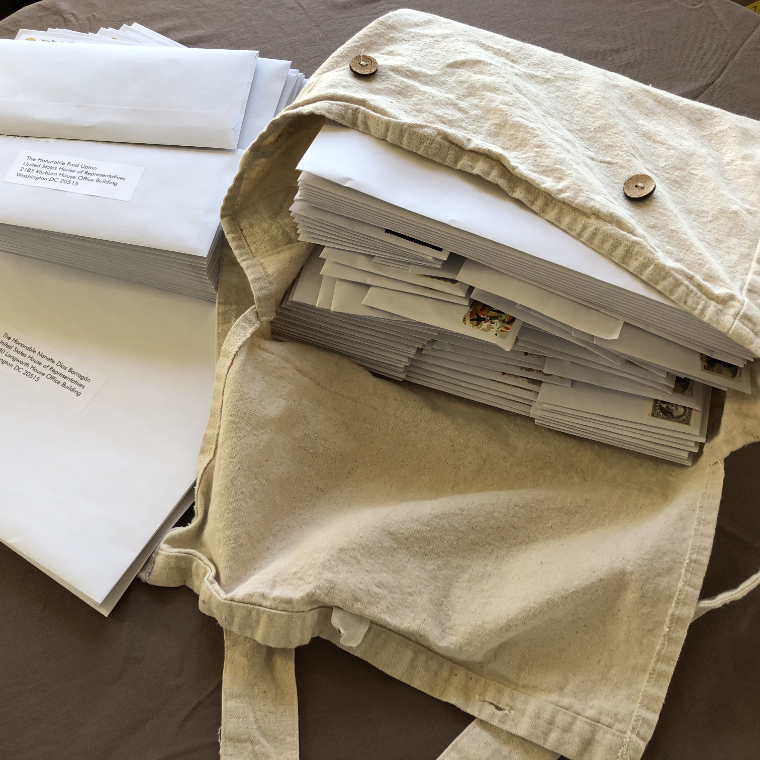 Photograph of Mail Bag Filled with Envelopes